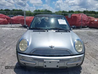 2002 MINI Hardtop with VIN WMWRC33432TE11649, listed as a IAAI auction lot 42583224 with 114,339 mi miles and . Bid and sale history available at DreamBid. Image 6.