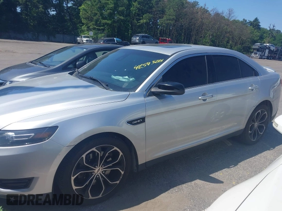 2015 Ford Taurus SHO с VIN 1FAHP2KT0FG191815, выставлен на аукционе IAAI как лот 42593226 с пробегом 125 493 миль миль и . История ставок и продаж доступна на DreamBid. Изображение 14.