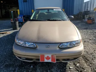 2002 Oldsmobile Alero GL1 z VIN 1G3NL52E62C265560, wystawiony jako Copart lot #56466914 z przebiegiem 206 213 mil mil oraz Szkoda całkowita • Salvage title. Historia ofert i sprzedaży dostępna na DreamBid. Obrazek 5.