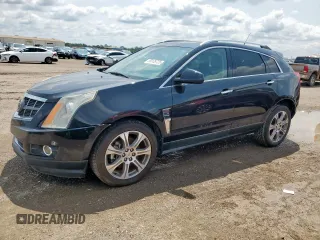 2012 Cadillac SRX Performance Collection z VIN 3GYFNBE32CS655956, wystawiony jako Copart lot #59135725 z przebiegiem 159 552 mil mil oraz Czysty tytuł • Clean title. Historia ofert i sprzedaży dostępna na DreamBid. Obrazek 1.