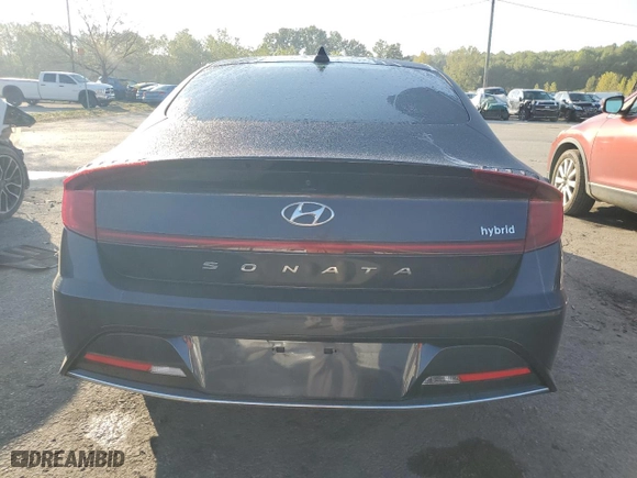 2021 Hyundai Sonata Hybrid SEL with VIN KMHL34JJ9MA019824, listed as a Copart auction lot 73162354 with 64,084 mi miles and Salvage Title. Bid and sale history available at carsss.com. Image 6.