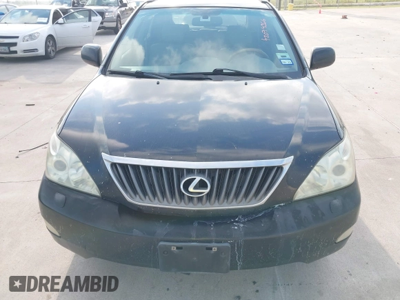 2008 Lexus RX with VIN 2T2HK31U38C064322, listed as a IAAI auction lot 42074366 with 241,459 mi miles. Bid and sale history available at carsss.com. Image 6.