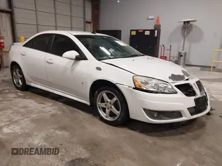 2009 Pontiac G6 1SB z VIN 1G2ZJ57K494243961, wystawiony jako IAAI lot #41560966 z przebiegiem 210 819 mil mil oraz . Historia ofert i sprzedaży dostępna na DreamBid. Obrazek 1.