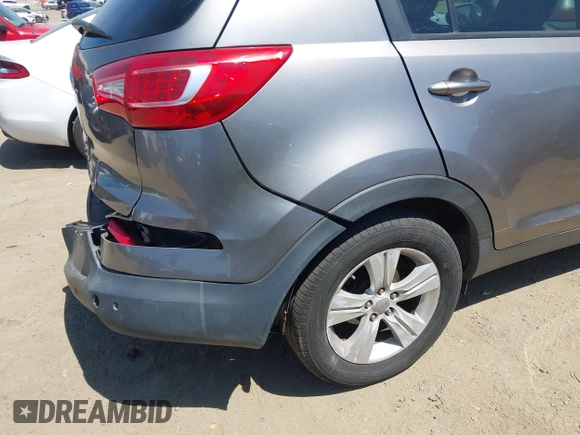 2011 Kia Sportage LX with VIN KNDPBCA20B7170217, listed as a IAAI auction lot 42303069 with 186,994 mi miles and . Bid and sale history available at DreamBid. Image 13.