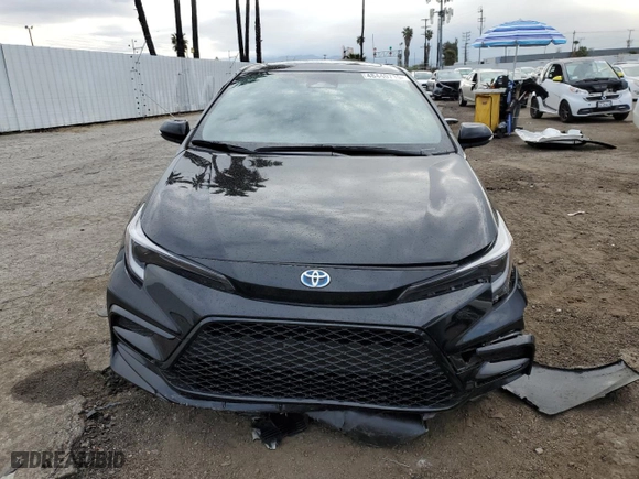 2024 Toyota Corolla Hybrid LE with VIN JTDBCMFE5RJ031956, listed as a Copart auction lot 48440715 with 13,971 mi miles and Salvage Title. Bid and sale history available at carsss.com. Image 5.