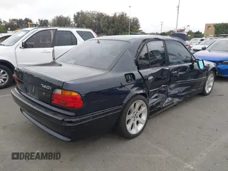 1998 BMW 7 Series with VIN WBAGF8323WDL57406, listed as a IAAI auction lot 42428227 with 93,448 mi miles and . Bid and sale history available at DreamBid. Image 4.