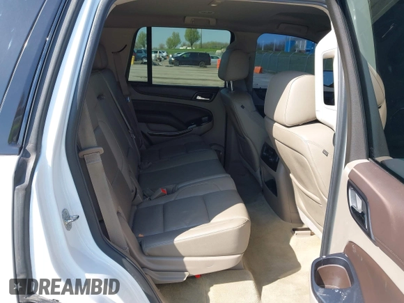2015 Chevrolet Tahoe LT with VIN 1GNSCBKCXFR552071, listed as a IAAI auction lot 41972157 with 214,738 mi miles and . Bid and sale history available at DreamBid. Image 8.