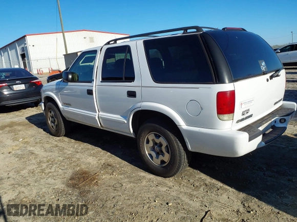 2002 Chevrolet Blazer LS z VIN 1GNDT13W32K146843, wystawiony jako IAAI lot #41497892 z przebiegiem 121 882 mil mil oraz . Historia ofert i sprzedaży dostępna na DreamBid. Obrazek 3.