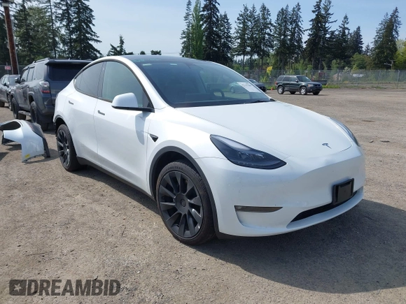 2023 Tesla Model Y Long Range with VIN 7SAYGDEE4PF676167, listed as a IAAI auction lot 42147909 with 20,488 mi miles. Bid and sale history available at carsss.com. Image 1.