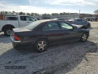 2001 Lincoln LS Luxury with VIN 1LNHM86S71Y623659, listed as a Copart auction lot 82634614 with 112,611 mi miles and Salvage Title. Bid and sale history available at DreamBid. Image 3.