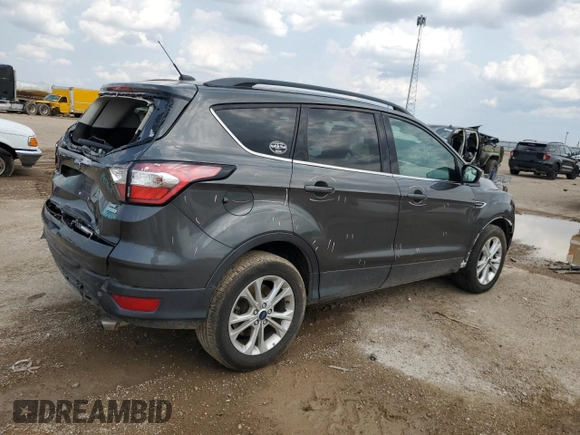 2018 Ford Escape SE with VIN 1FMCU0G90JUB62738, listed as a Copart auction lot 63380654 with 157,762 mi miles and Salvage Title. Bid and sale history available at carsss.com. Image 3.