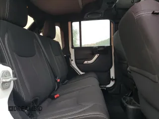 2013 Jeep Wrangler Unlimited Sahara with VIN 1C4HJWEG4DL562951, listed as a Copart auction lot 58001475 with 95,744 mi miles and Clean title. Bid and sale history available at DreamBid. Image 10.
