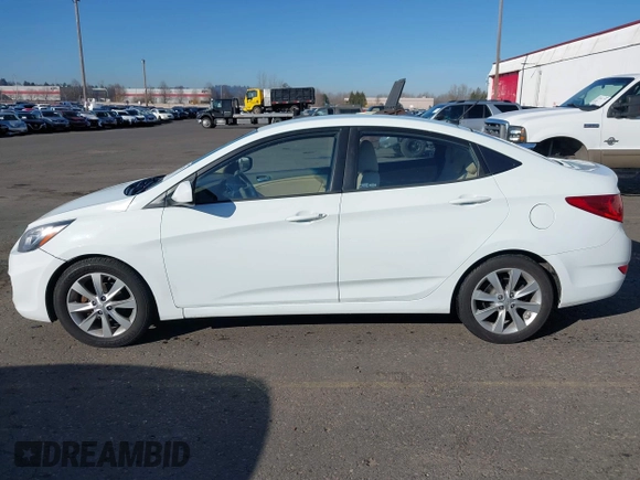 2012 Hyundai Accent GLS with VIN KMHCU4AE3CU246908, listed as a IAAI auction lot 41696958 with 175,164 mi miles. Bid and sale history available at carsss.com. Image 14.