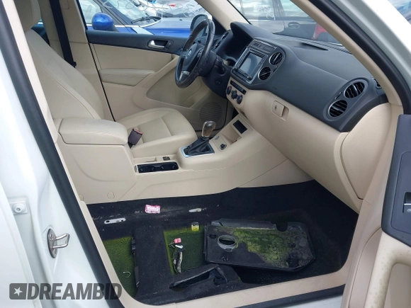 2017 Volkswagen Tiguan Wolfsburg Edition with VIN WVGRV7AX1HW505773, listed as a IAAI auction lot 38026893 with 63,026 mi miles and . Bid and sale history available at DreamBid. Image 5.