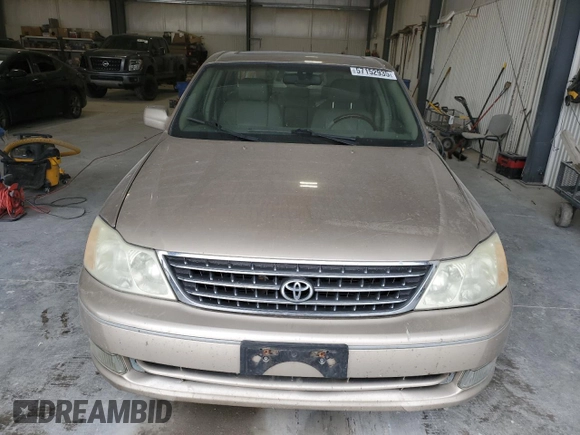 2003 Toyota Avalon XL z VIN 4T1BF28B03U280486, wystawiony jako Copart lot #57152935 z przebiegiem 131 996 mil mil oraz Szkoda całkowita • Salvage title. Historia ofert i sprzedaży dostępna na DreamBid. Obrazek 5.