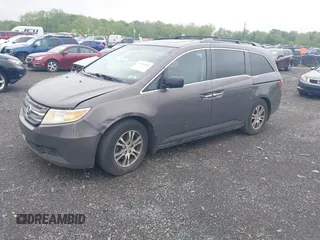 2012 Honda Odyssey EX-L with VIN 5FNRL5H64CB060468, listed as a IAAI auction lot 42182501 with 236,399 mi miles and . Bid and sale history available at carsss.com. Image 17.