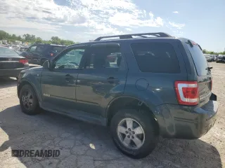 2008 Ford Escape XLT with VIN 1FMCU03198KA67732, listed as a Copart auction lot 56878455 with 105,619 mi miles and Salvage title. Bid and sale history available at DreamBid. Image 2.