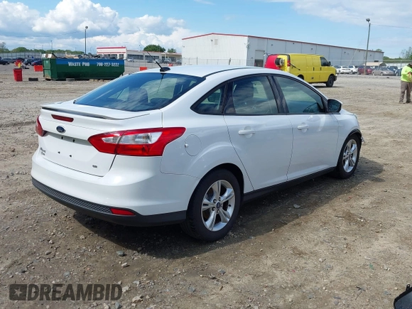 2012 Ford Focus SE with VIN 1FAHP3F2XCL122141, listed as a IAAI auction lot 42008877 with 122,743 mi miles. Bid and sale history available at carsss.com. Image 4.