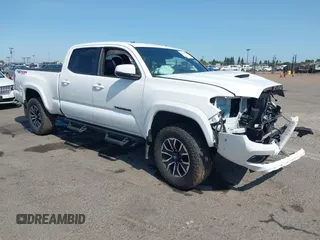 2021 Toyota Tacoma SR5 with VIN 3TMDZ5BN7MM115744, listed as a IAAI auction lot 42544376 with 58,311 mi miles and . Bid and sale history available at DreamBid. Image 1.