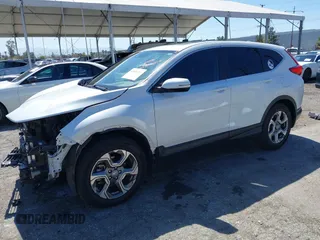 2019 Honda CR-V EX z VIN 5J6RW1H59KA012571, wystawiony jako IAAI lot #41830202 z przebiegiem 49 987 mil mil oraz . Historia ofert i sprzedaży dostępna na DreamBid. Obrazek 18.