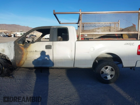 2007 Ford F-150 STX with VIN 1FTRX14W57KC44619, listed as a IAAI auction lot 41402821 with Not provided miles and . Bid and sale history available at DreamBid. Image 13.