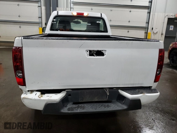 2011 Chevrolet Colorado Work Truck z VIN 1GCCSBF98B8119542, wystawiony jako Copart lot #55825545 z przebiegiem 75 939 mil mil oraz Szkoda całkowita • Salvage title. Historia ofert i sprzedaży dostępna na DreamBid. Obrazek 6.