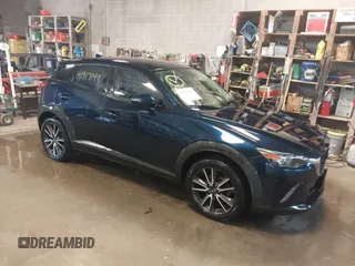2017 Mazda CX-3 Touring with VIN JM1DKFC72H0145267, listed as a IAAI auction lot 41917149 with 55,784 mi miles. Bid and sale history available at carsss.com. Image 1.