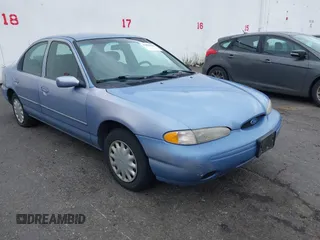 1996 Ford Contour LX with VIN 1FALP6534TK196831, listed as a IAAI auction lot 41895630 with 158,477 mi miles and . Bid and sale history available at DreamBid. Image 1.