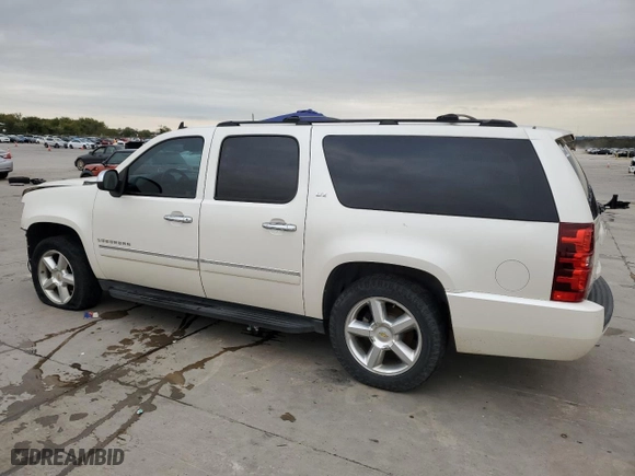 2012 Chevrolet Suburban LTZ with VIN 1GNSCKE08CR230252, listed as a Copart auction lot 79017724 with 183,686 mi miles and Clean Title. Bid and sale history available at carsss.com. Image 2.