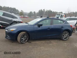 2018 Mazda 3 Touring with VIN 3MZBN1L34JM204883, listed as a IAAI auction lot 41094541 with 125,205 mi miles and . Bid and sale history available at DreamBid. Image 14.