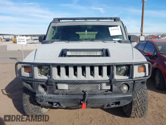 2003 Hummer H2 with VIN 5GRGN23U13H128617, listed as a IAAI auction lot 41494349 with 135,295 mi miles. Bid and sale history available at carsss.com. Image 12.