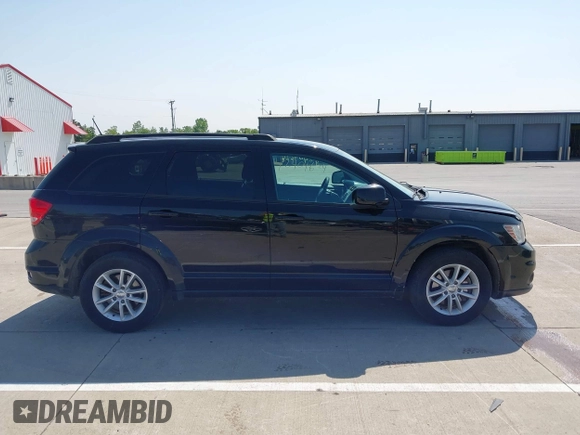 2017 Dodge Journey SXT with VIN 3C4PDCBG1HT523010, listed as a IAAI auction lot 42404624 with 198,519 mi miles and . Bid and sale history available at DreamBid. Image 13.