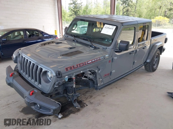 2022 Jeep Gladiator Rubicon with VIN 1C6JJTBG6NL166081, listed as a IAAI auction lot 42204431 with 40,568 mi miles and . Bid and sale history available at DreamBid. Image 2.