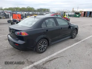 2015 Mitsubishi Lancer SE with VIN JA32V2FW2FU002303, listed as a IAAI auction lot 41927592 with 32,444 mi miles. Bid and sale history available at carsss.com. Image 4.