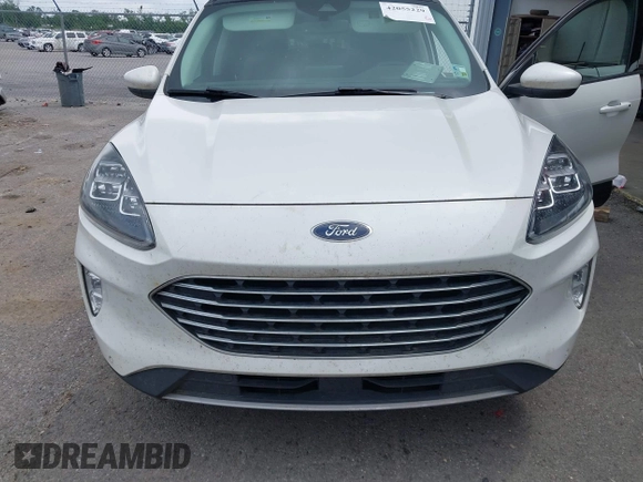 2021 Ford Escape Titanium with VIN 1FMCU9J93MUA36648, listed as a IAAI auction lot 42055229 with 122,864 mi miles and . Bid and sale history available at carsss.com. Image 6.