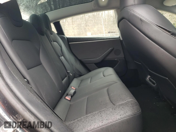2024 Tesla Model 3 with VIN 5YJ3E1EA7RF858716, listed as a Copart auction lot 49809325 with 9,936 mi miles and Non Repairable. Bid and sale history available at DreamBid. Image 10.