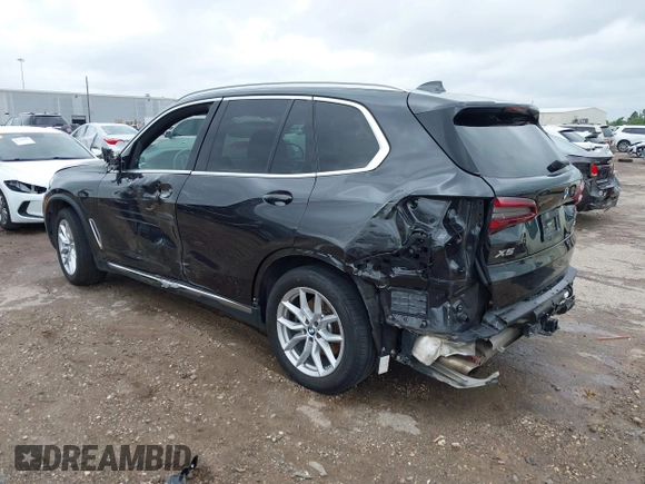 2021 BMW X5 xDrive45e with VIN 5UXTA6C02M9F88978, listed as a IAAI auction lot 42201563 with 23,339 mi miles and . Bid and sale history available at DreamBid. Image 3.