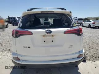 2018 Toyota RAV4 LE z VIN JTMBFREV2JD253105, wystawiony jako Copart lot #58011225 z przebiegiem 68 130 mil mil oraz Szkoda całkowita • Salvage title. Historia ofert i sprzedaży dostępna na DreamBid. Obrazek 6.