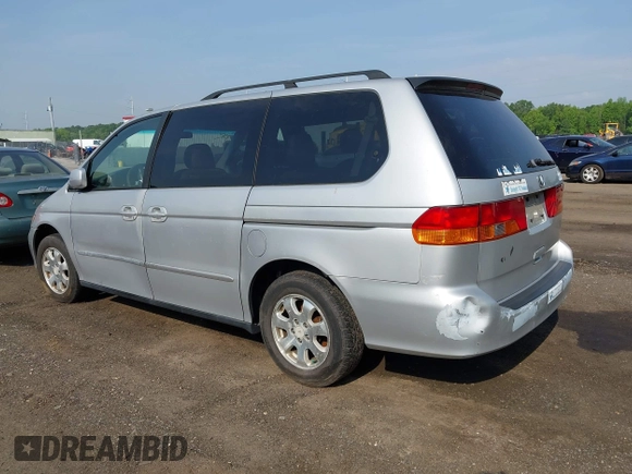2002 Honda Odyssey EX-L z VIN 2HKRL18062H533064, wystawiony jako IAAI lot #42273694 z przebiegiem Nie podano mil oraz . Historia ofert i sprzedaży dostępna na DreamBid. Obrazek 3.
