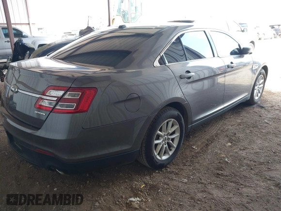 2014 Ford Taurus SE with VIN 1FAHP2D89EG136335, listed as a IAAI auction lot 41880655 with 211,635 mi miles. Bid and sale history available at carsss.com. Image 4.