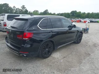 2017 BMW X5 xDrive40e iPerformance with VIN 5UXKT0C30H0V95867, listed as a IAAI auction lot 42122827 with 84,271 mi miles. Bid and sale history available at carsss.com. Image 4.