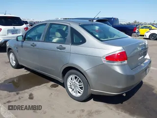 2008 Ford Focus SE with VIN 1FAHP35N68W154490, listed as a IAAI auction lot 42128643 with 141,316 mi miles. Bid and sale history available at carsss.com. Image 3.