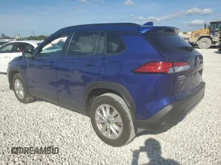 2023 Toyota Corolla Cross LE with VIN 7MUCAAAG0PV063737, listed as a Copart auction lot 86267914 with 13,740 mi miles and Salvage title. Bid and sale history available at DreamBid. Image 2.