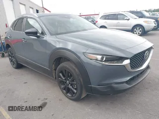 2022 Mazda CX-30 S Carbon Edition with VIN 3MVDMBCL6NM431985, listed as a IAAI auction lot 42610558 with Not provided miles and . Bid and sale history available at DreamBid. Image 1.