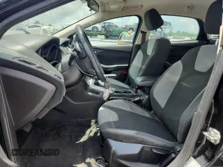 2012 Ford Focus SE z VIN 1FAHP3K25CL248672, wystawiony jako Copart lot #58129345 z przebiegiem 124 687 mil mil oraz Szkoda całkowita • Salvage title. Historia ofert i sprzedaży dostępna na DreamBid. Obrazek 7.