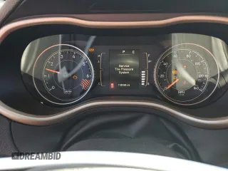 2015 Jeep Cherokee Sport with VIN 1C4PJLAB2FW517187, listed as a Copart auction lot 53252985 with 118,098 mi miles and Salvage Title. Bid and sale history available at carsss.com. Image 9.