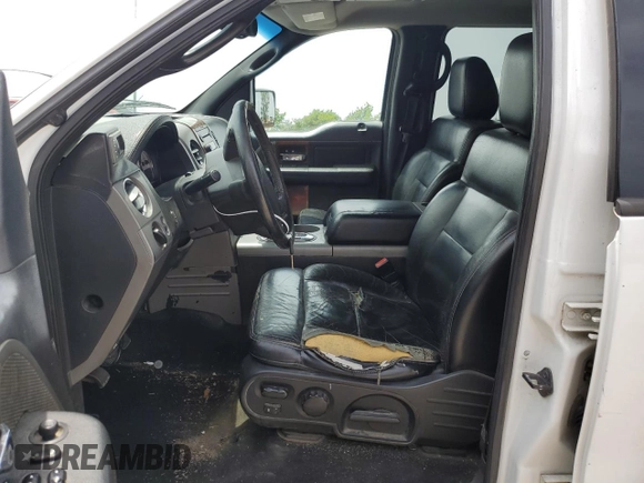 2004 Ford F-150 XLT with VIN 1FTPW14554KC27784, listed as a Copart auction lot 60741985 with 3,163 mi miles and Salvage title. Bid and sale history available at DreamBid. Image 7.