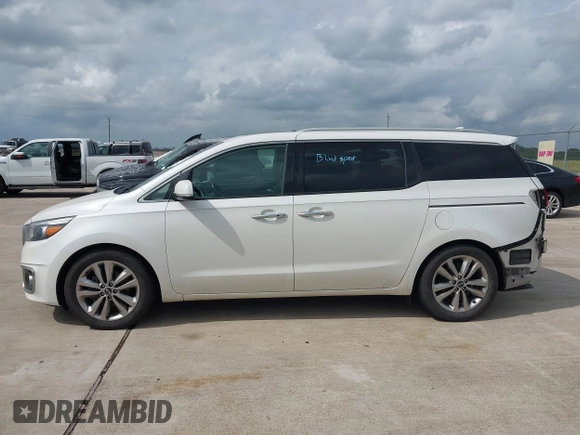 2015 Kia Sedona SX-L with VIN KNDME5C12F6028893, listed as a IAAI auction lot 42109514 with 169,303 mi miles and . Bid and sale history available at DreamBid. Image 14.
