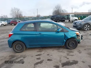 2013 Toyota Yaris L with VIN JTDJTUD38DD553999, listed as a IAAI auction lot 41642903 with 75,795 mi miles. Bid and sale history available at carsss.com. Image 13.