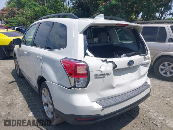 2017 Subaru Forester Touring z VIN JF2SJAWC1HH463163, wystawiony jako IAAI lot #42480107 z przebiegiem 70 337 mil mil oraz . Historia ofert i sprzedaży dostępna na DreamBid. Obrazek 3.